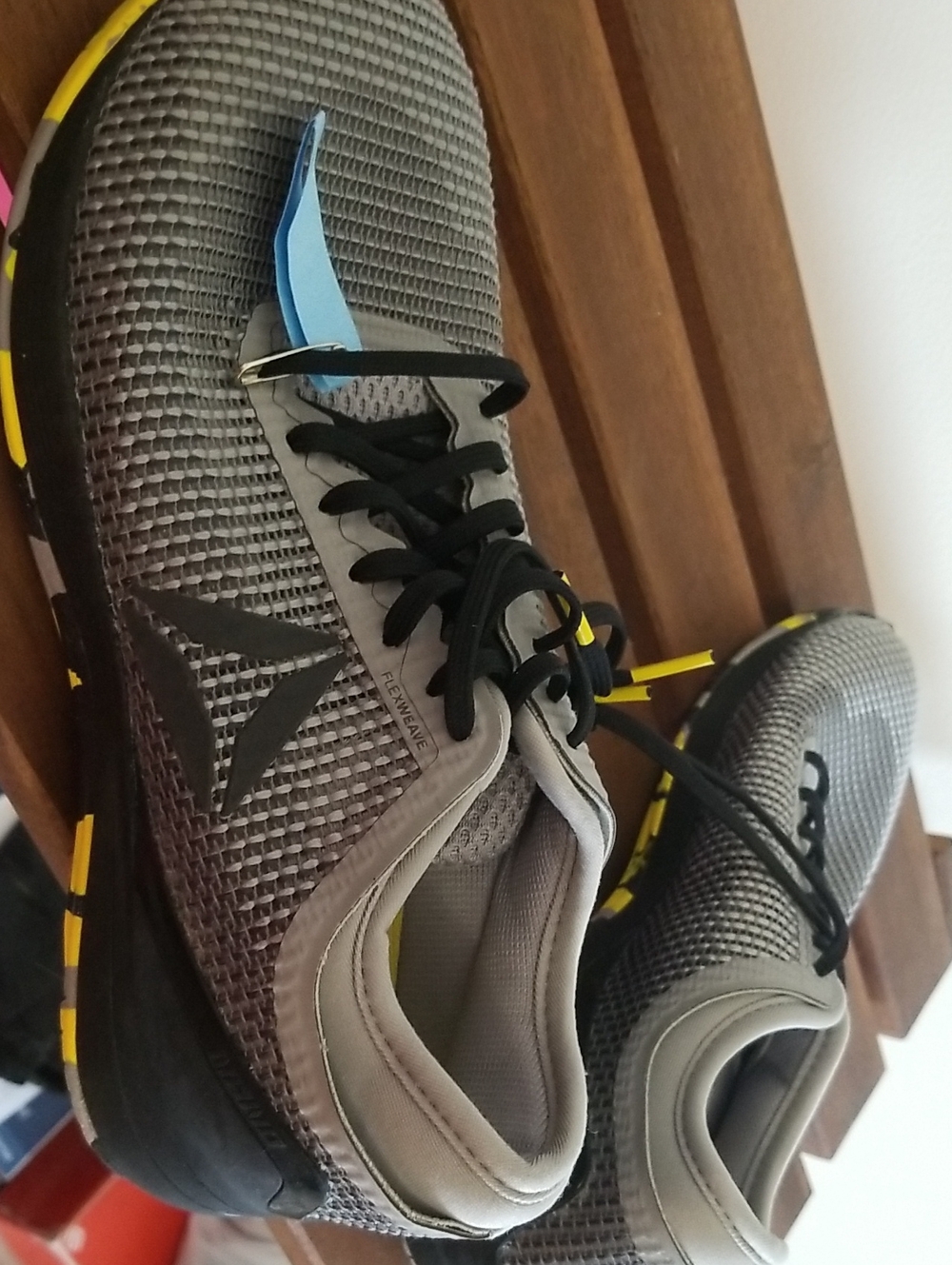 Reebok Men’s Gray Athletic Sneakers with Yellow and Blue Accents